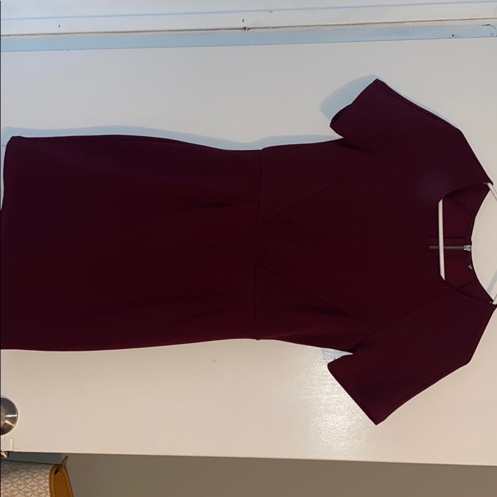 Women’s casual maroon dress.